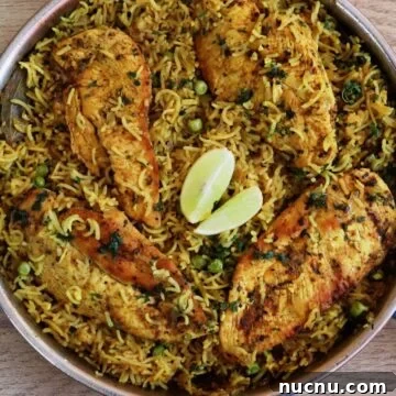 one-pot mediterranean chicken and rice in a skillet.
