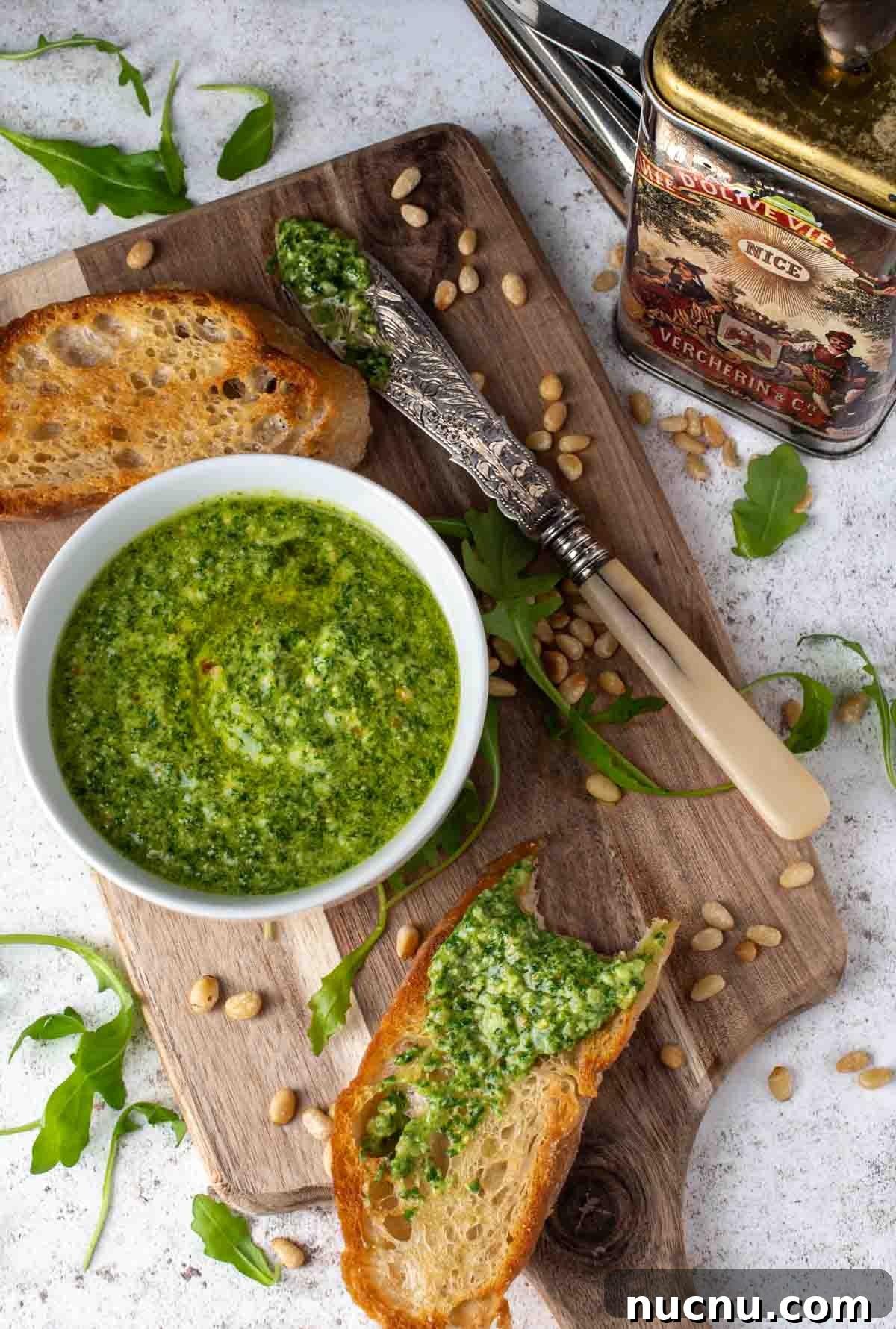 Arugula Pesto: Quick Recipe for Peppery Homemade Sauce 2 Arugula pesto, also known as rocket pesto, served with toasted ciabatta.