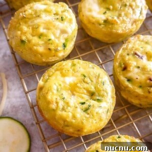 Zucchini Egg Muffin Cups: Protein-Packed Breakfast Bites 14 Healthy Zucchini Egg Muffin Cups cooling on a wire rack