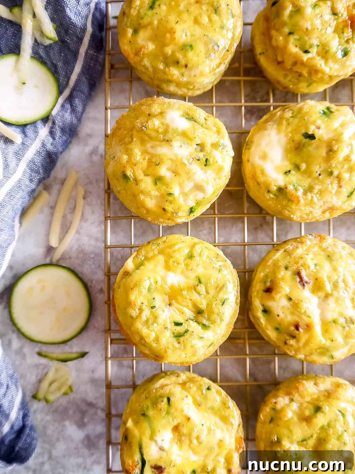 Zucchini Egg Muffin Cups: Protein-Packed Breakfast Bites 3 Zucchini egg cups on wire rack.