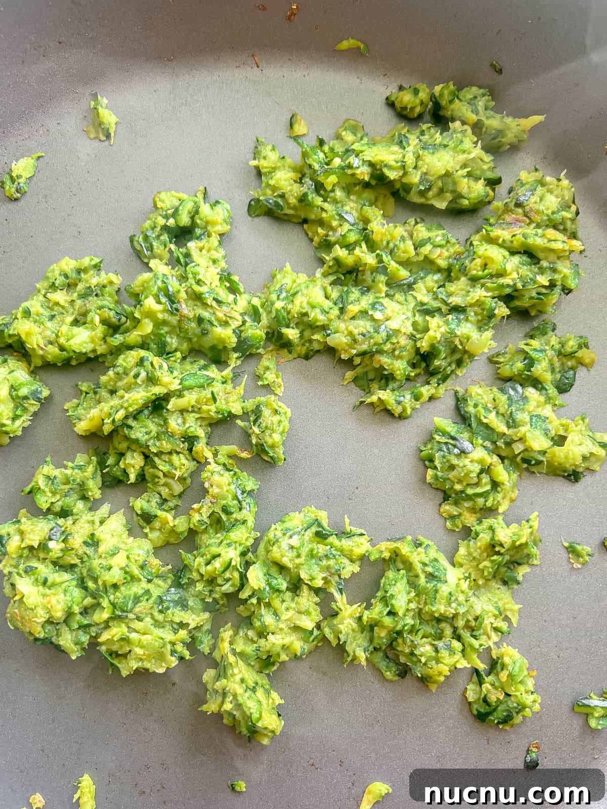 Zucchini Egg Muffin Cups: Protein-Packed Breakfast Bites 6 Eggs mixed together in a bowl.