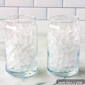 Strawberry Breeze Cocktail Copycat Recipe: Refreshing Homemade Drink 11 Pebble ice in two clear drinking glasses.