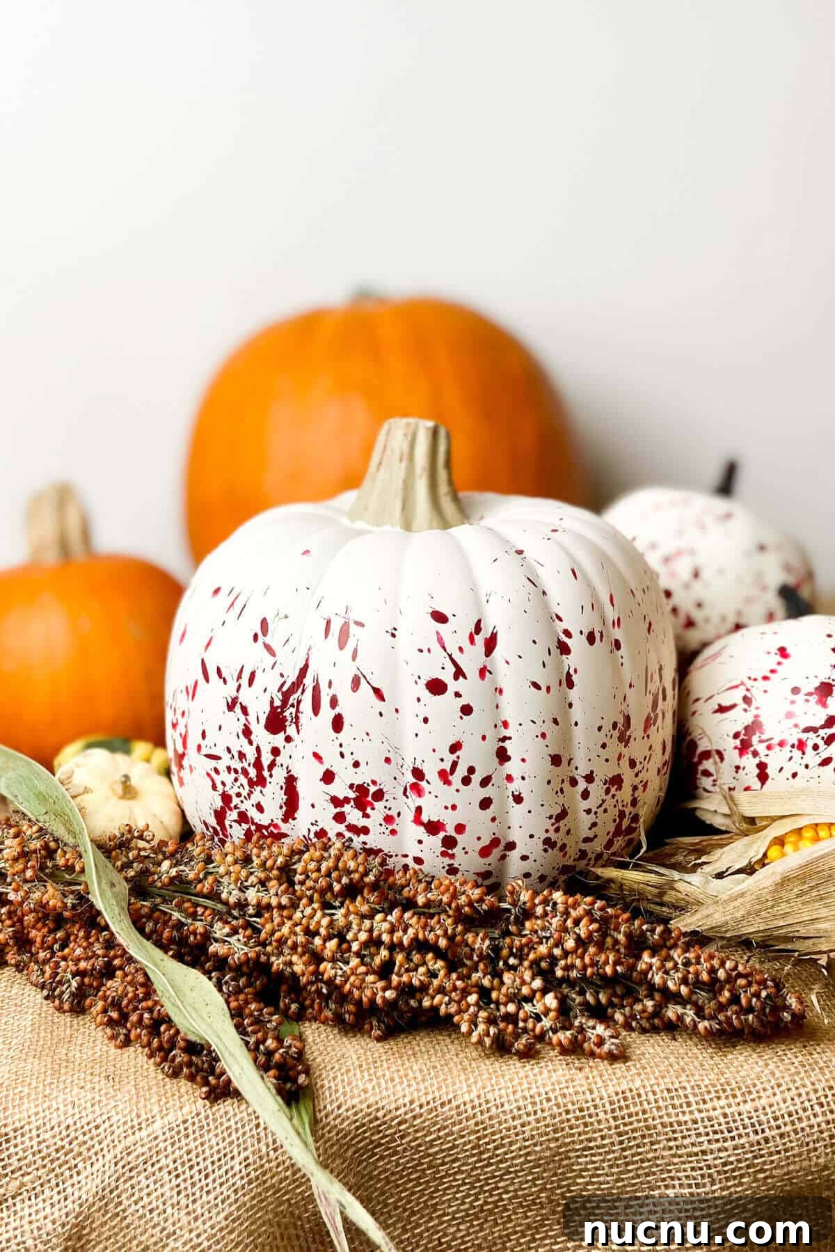 Finished paint splatter pumpkins.