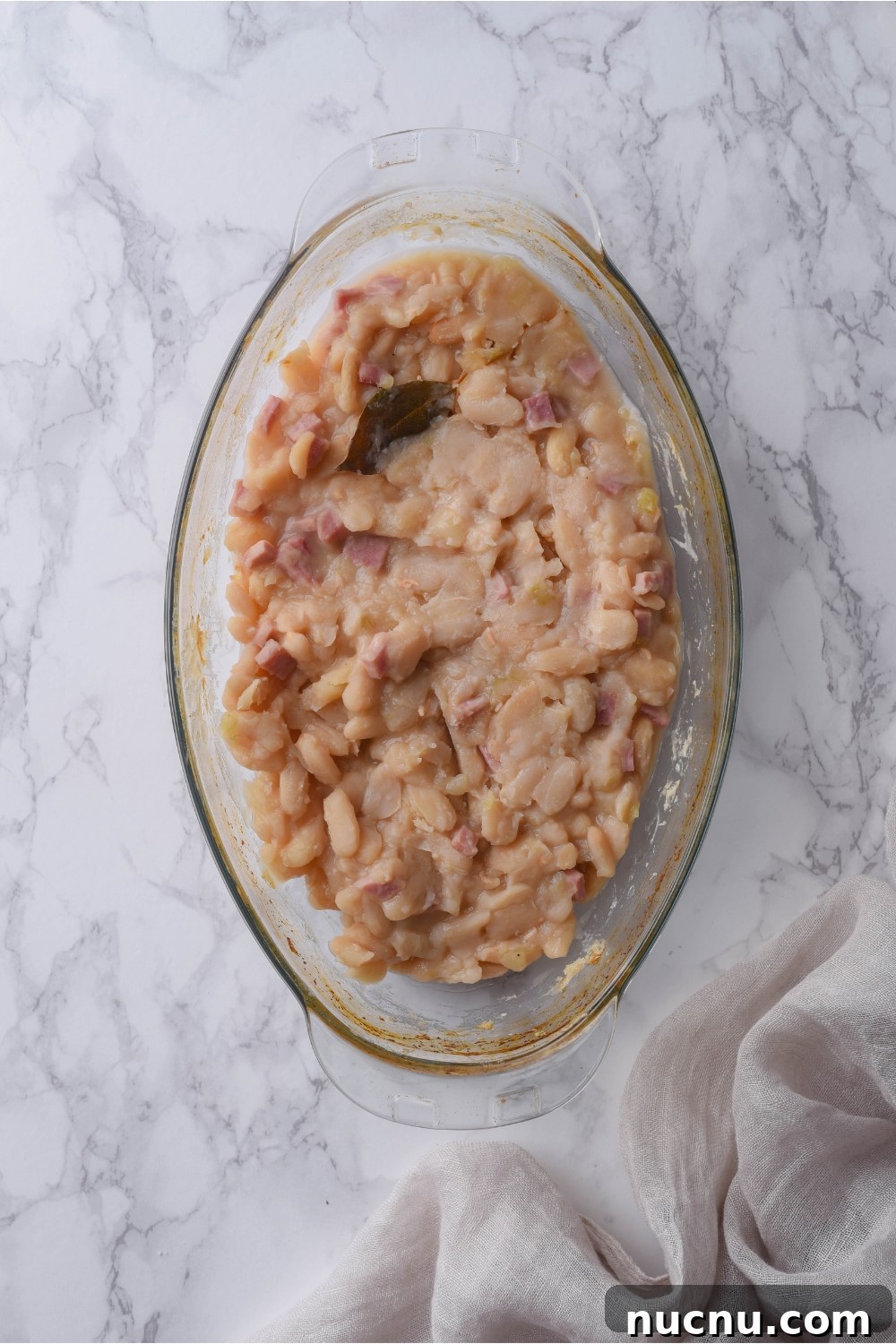 Copycat Grandma Brown's Baked Beans Recipe You’ll Love 8 A clear baking dish filled with Grandma Brown's baked beans.