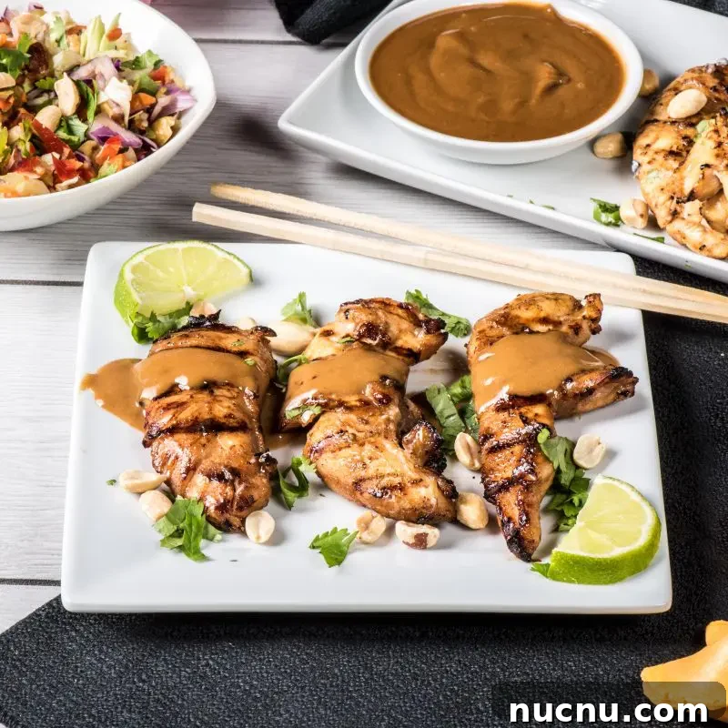 Chicken Satay with Peanut Sauce Recipe — Grilled Skewers & Dipping Sauce 4 Chicken satay closeup