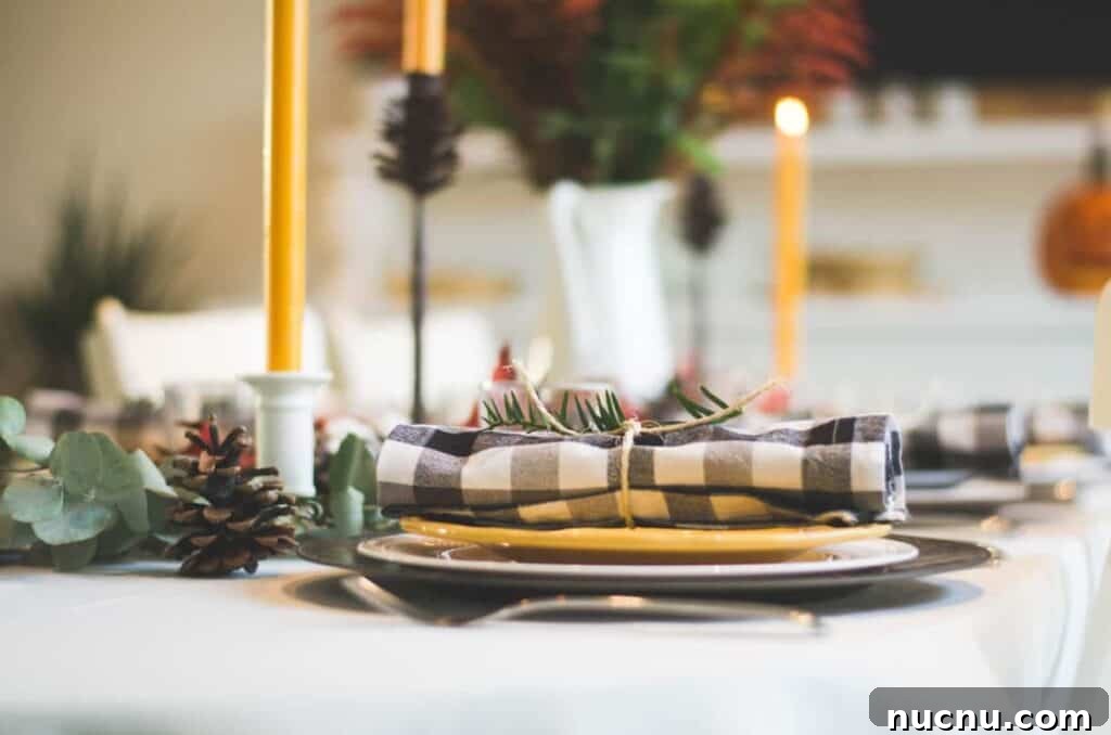 Celiac Disease and Navigating Holiday Gatherings Safely 2 Photo by Libby Penner on Unsplash. Black and yellow holiday tablescape with Jack-o-lantern.