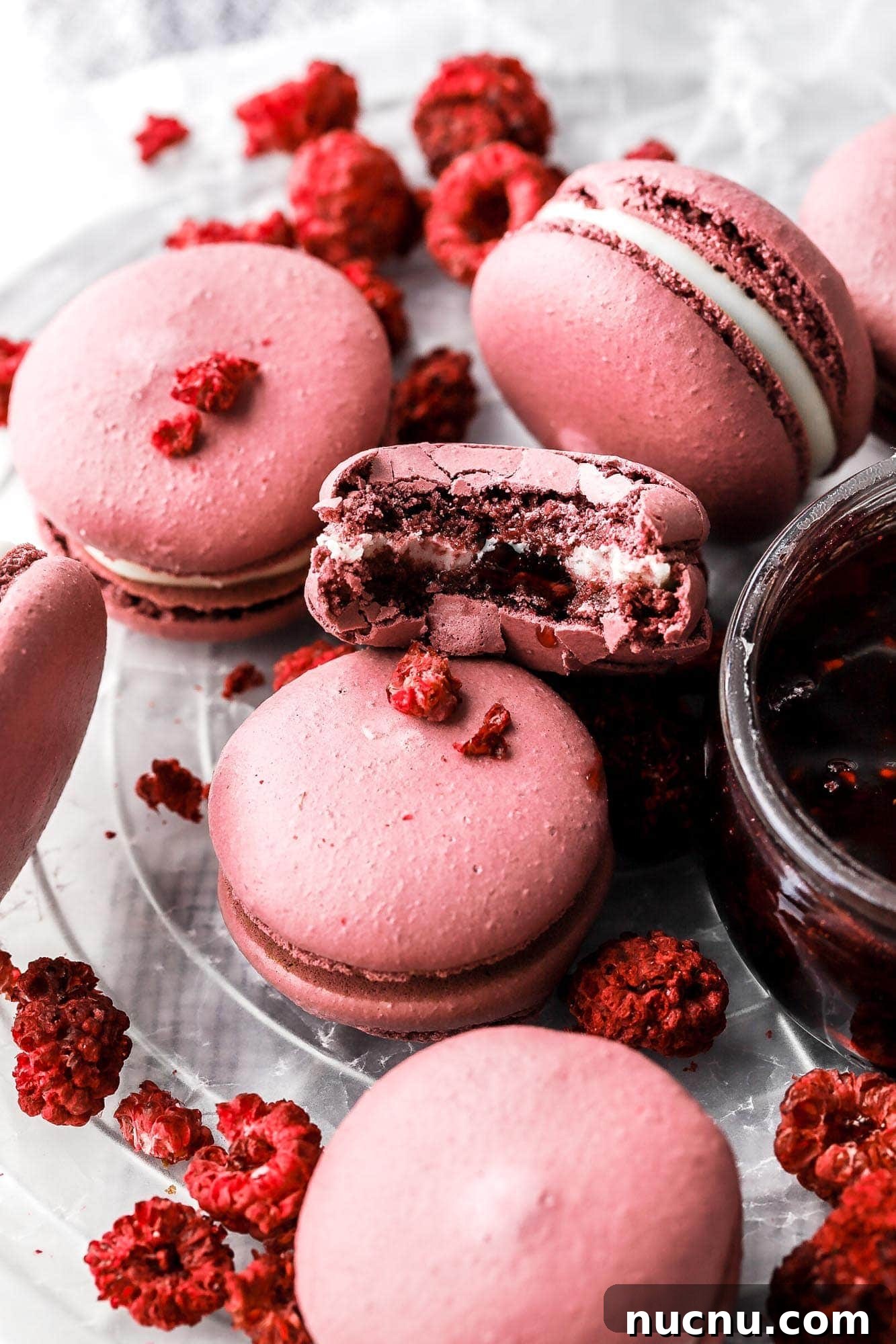 raspberry macarons with white chocolate ganache and raspberry jam
