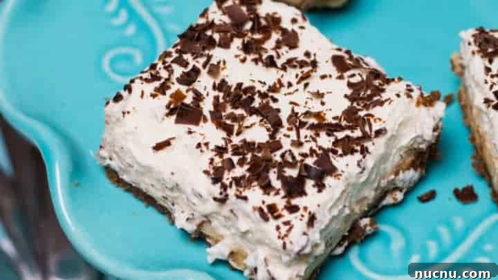 Keto Chocolate Peanut Butter Dessert Bars on a blue plate