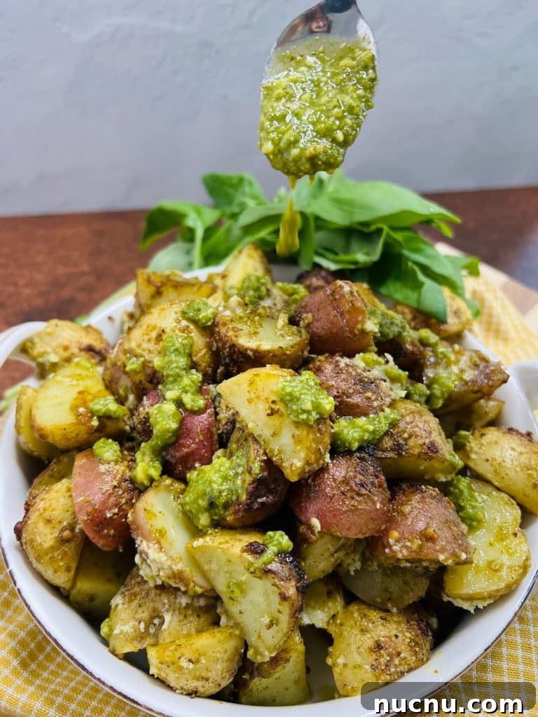 Crispy Pesto-Roasted Potatoes with Garlic and Parmesan 14 Pesto Roasted Potatoes Styled Photo in Bowl.