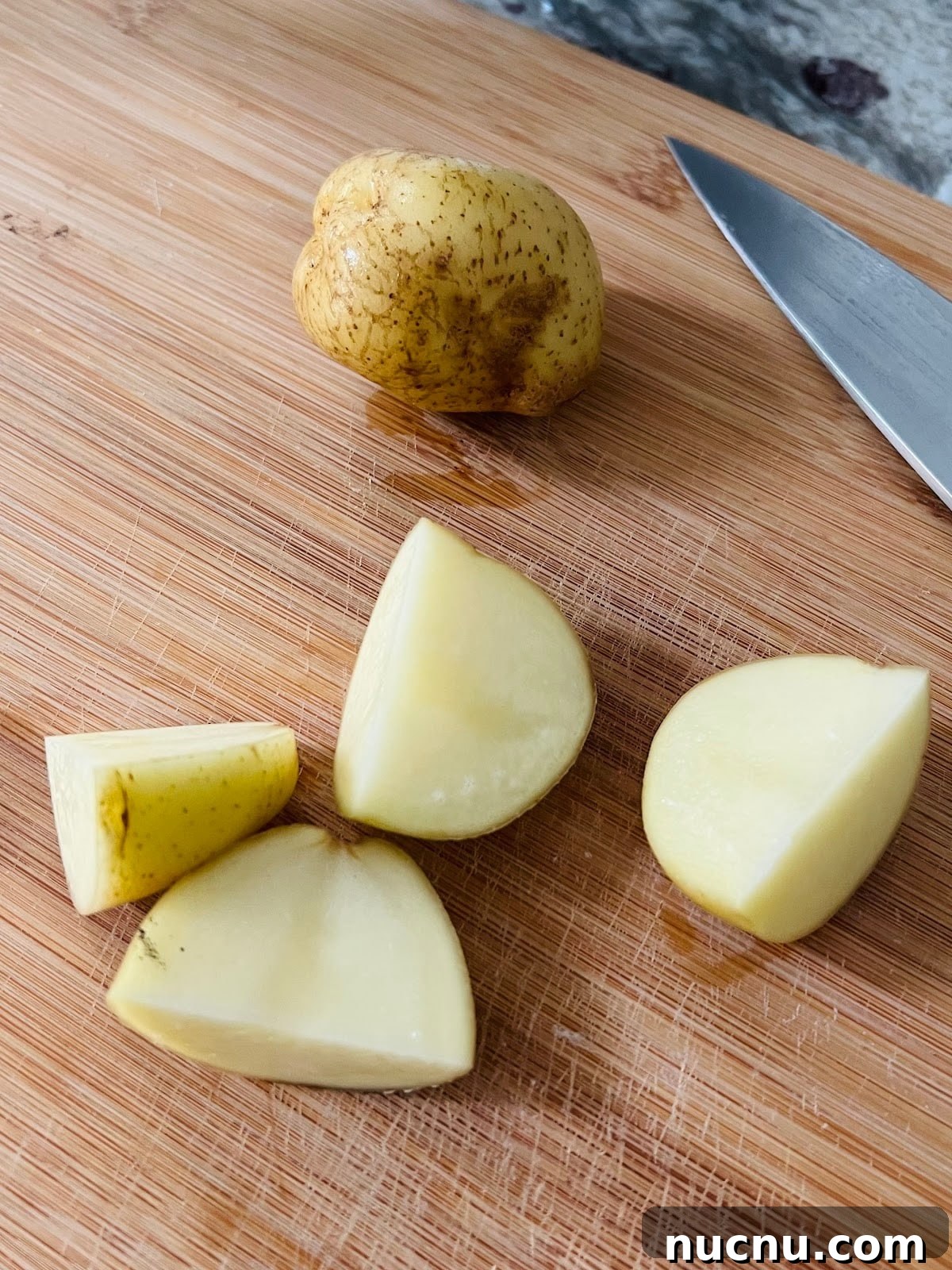 Crispy Pesto-Roasted Potatoes with Garlic and Parmesan 6 Cutting Potatoes.