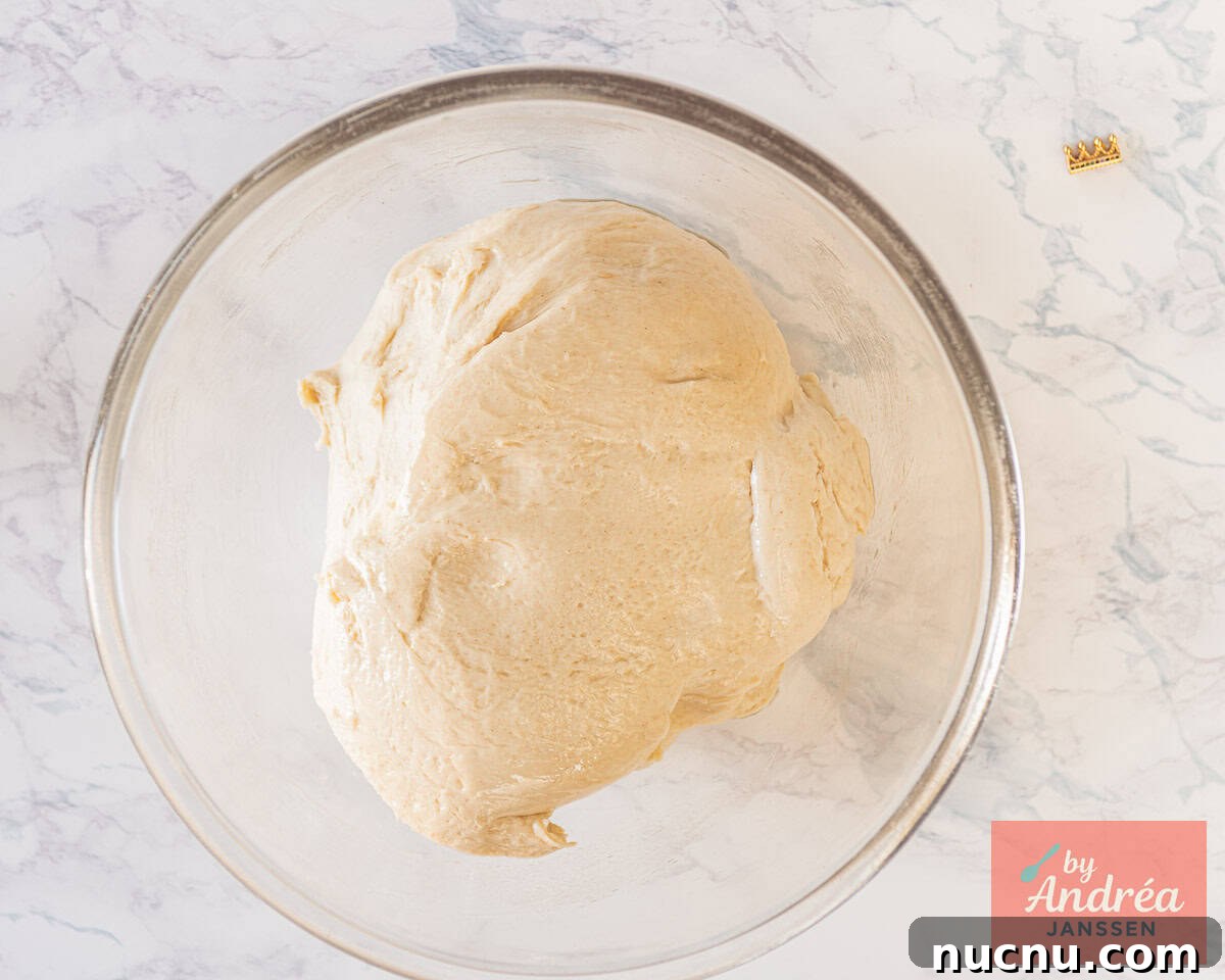 Crispy-Edged Tomato Focaccia with Parmesan and Olive Oil 4 Dough in a glass bowl