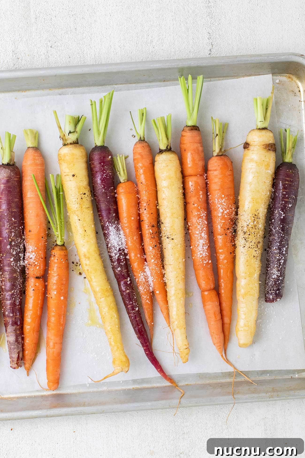 Roasted Rainbow Carrots with Garlic and Fresh Thyme 5 Rainbow carrots sprinkled with kosher salt and black pepper.