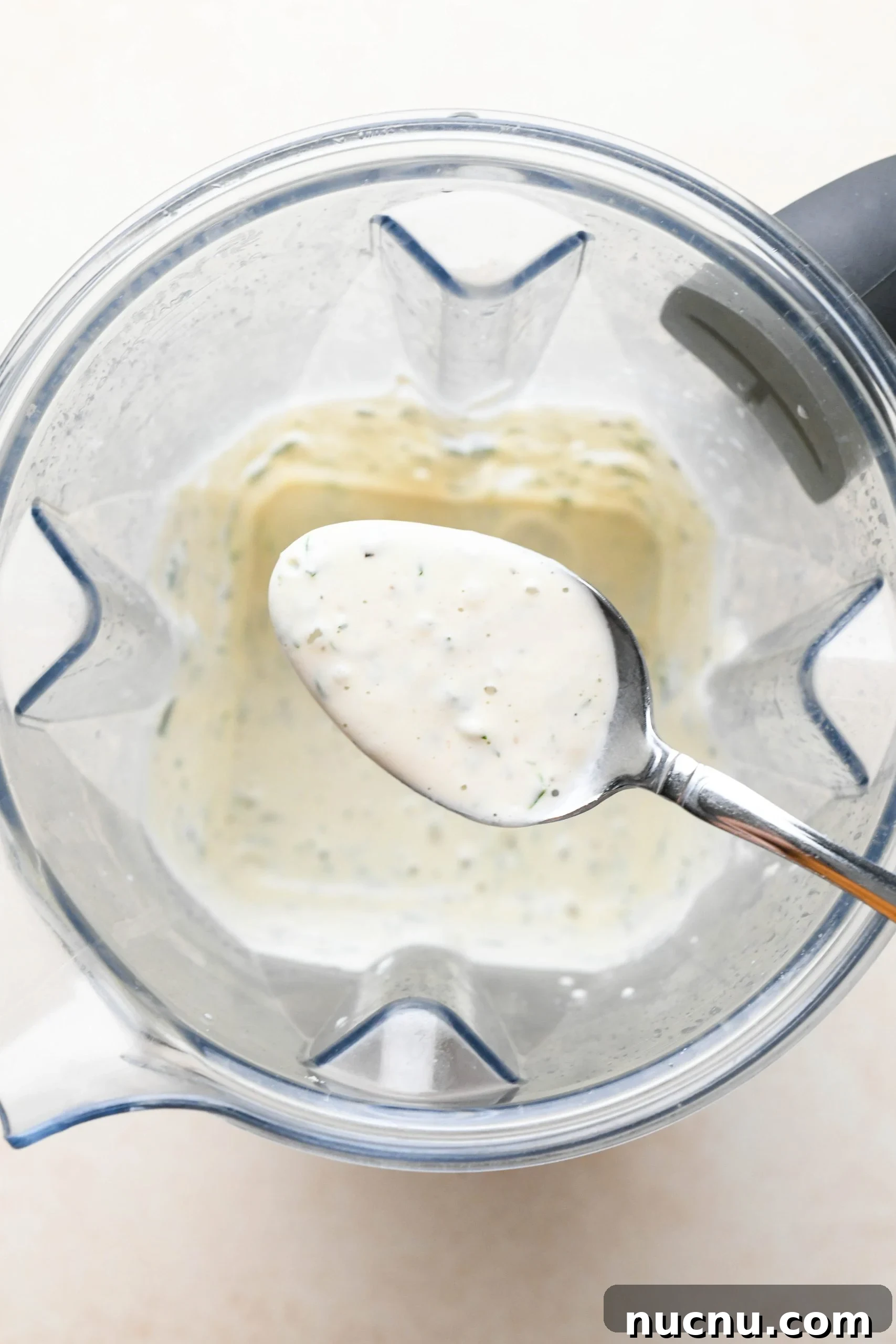 Creamy Raw Cashew Vegan Ranch Dressing Recipe 9 How to make vegan ranch dressing: Herbs and pepper pulsed into blended cashews in blender container.
