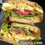 Classic Egg Salad Sandwich with Crispy Potato Chips 3 Egg Salad sandwich with chips