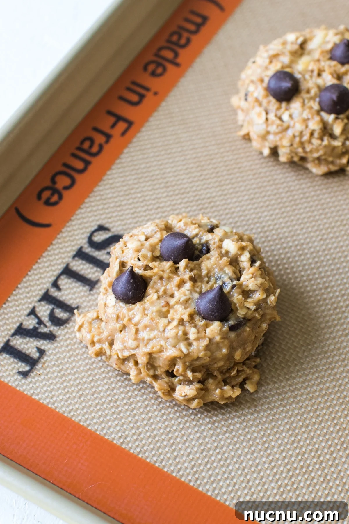 a breakfast cookie on a silicone baking mat