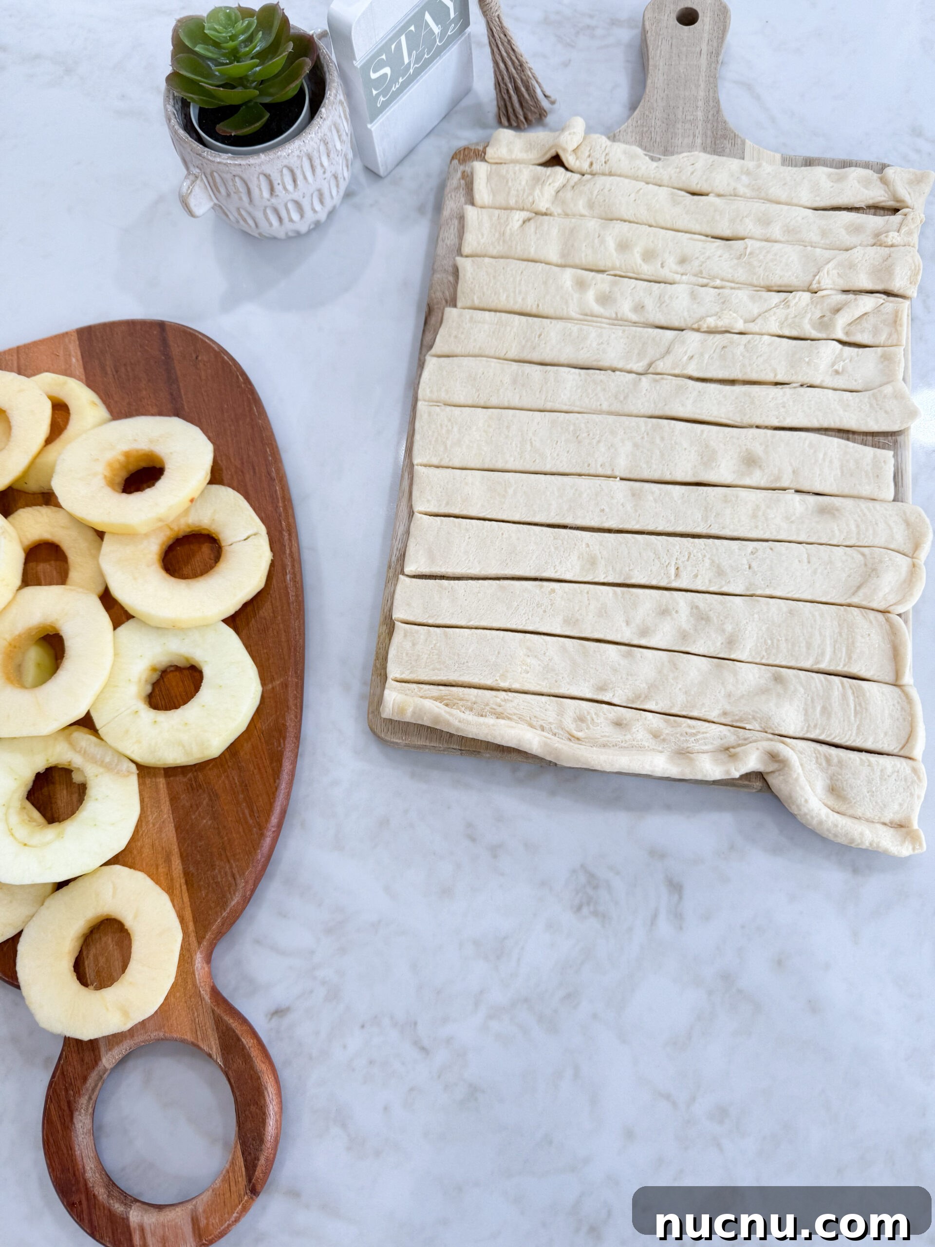 Unrolled crescent dough, cut into thin strips on the counter
