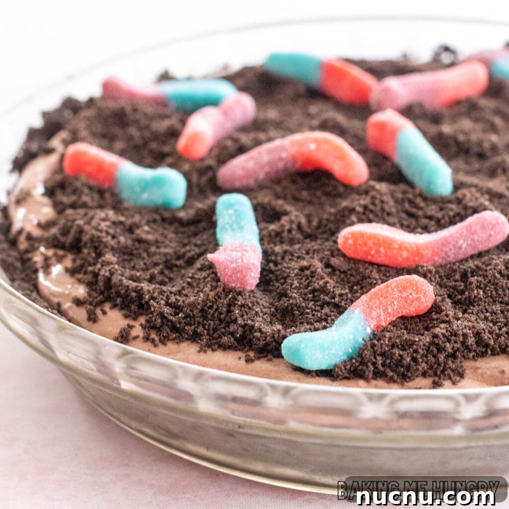 Decadent Chocolate Mud Pie Recipe: Creamy No-Bake Dessert 2 close up of gummy worms on top of the mud pie recipe