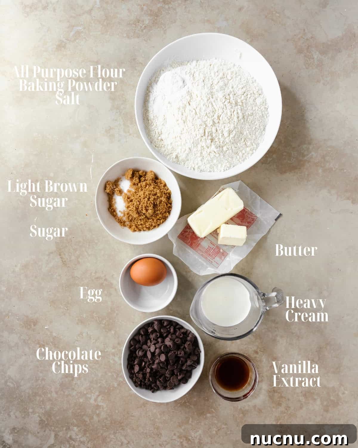 Crispy Chocolate Chip Scones Recipe for Perfect Morning Pastries 3
Granulated Sugar: Maple sugar would also work well to make these scones refined sugar free.
All Purpose Flour: Make these scones gluten free, by using a good 1-1 gluten free flour. I recommend using the one from Bob’s Red Mill. Measure based off of the weight (300 g) versus cup for cup.
Baking Powder: This acts as a leavener in this scone recipe.
Unsalted Butter: Vegan butter or plant based can also be used in place of regular unsalted butter. Just make sure the butter is very cold or even frozen.
Egg: This recipe has not been tested without eggs.
Heavy Cream: For soft and tender scones, heavy cream is a must. Substitute with half and half or buttermilk.
Vanilla Extract: This is a nice background flavor that pairs well with chocolate chips.
Mini Chocolate Chips: I prefer the mini chocolate chips, but feel free to use regular, milk chocolate, dark chocolate or even chocolate chunks.