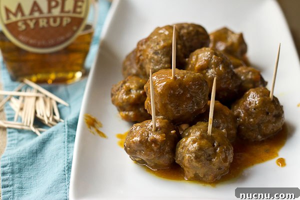 Maple-Glazed Slow Cooker Meatballs with Tangy Cranberry Sauce 6 Slow Cooker BBQ Meatballs ready to serve.