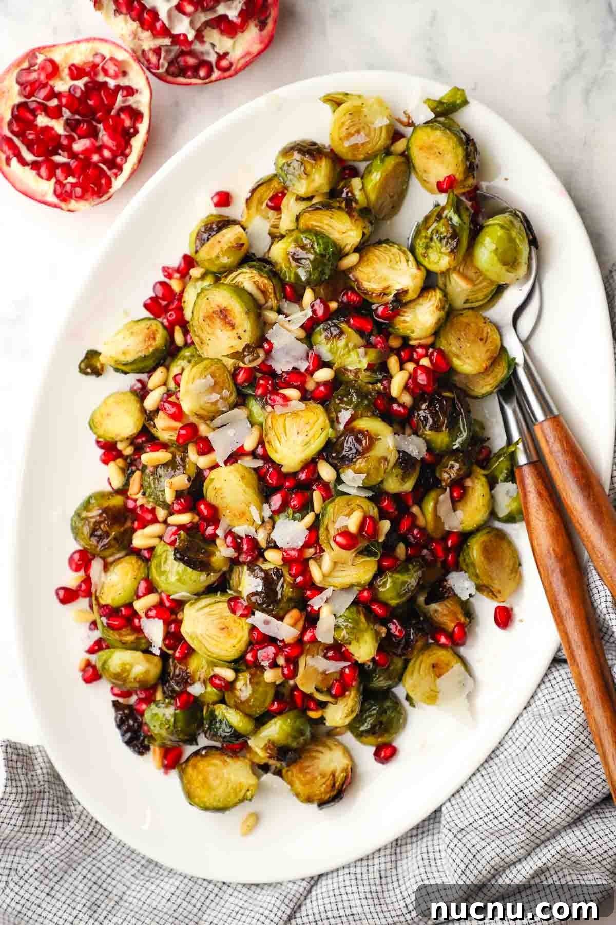 overhead view of a dish of roasted Brussels sprouts with pomegranates