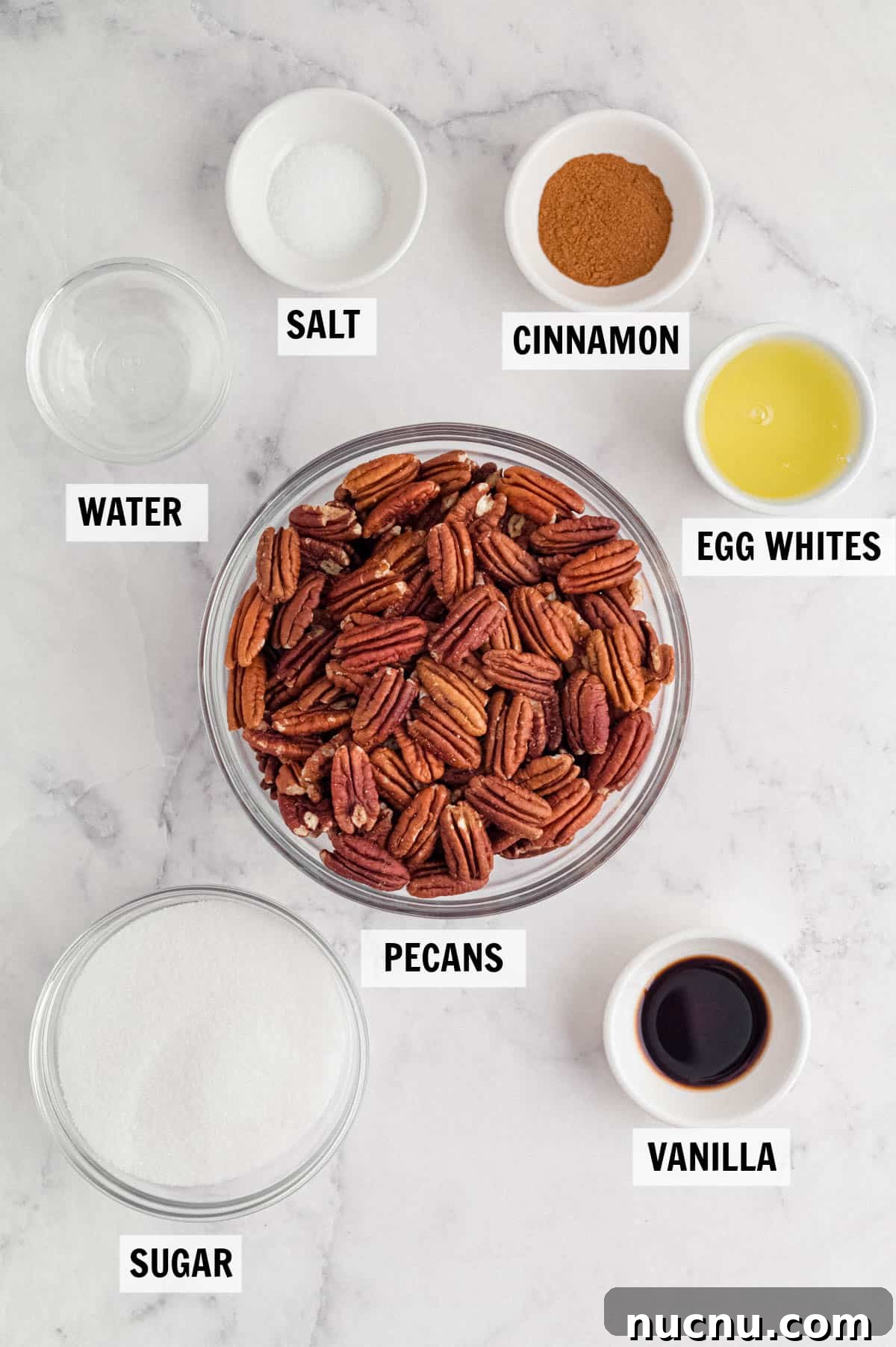 Sweet and Sticky Candied Pecans Recipe for Holiday Gifts 3 all of the ingredients for the candied pecans on a white countertop