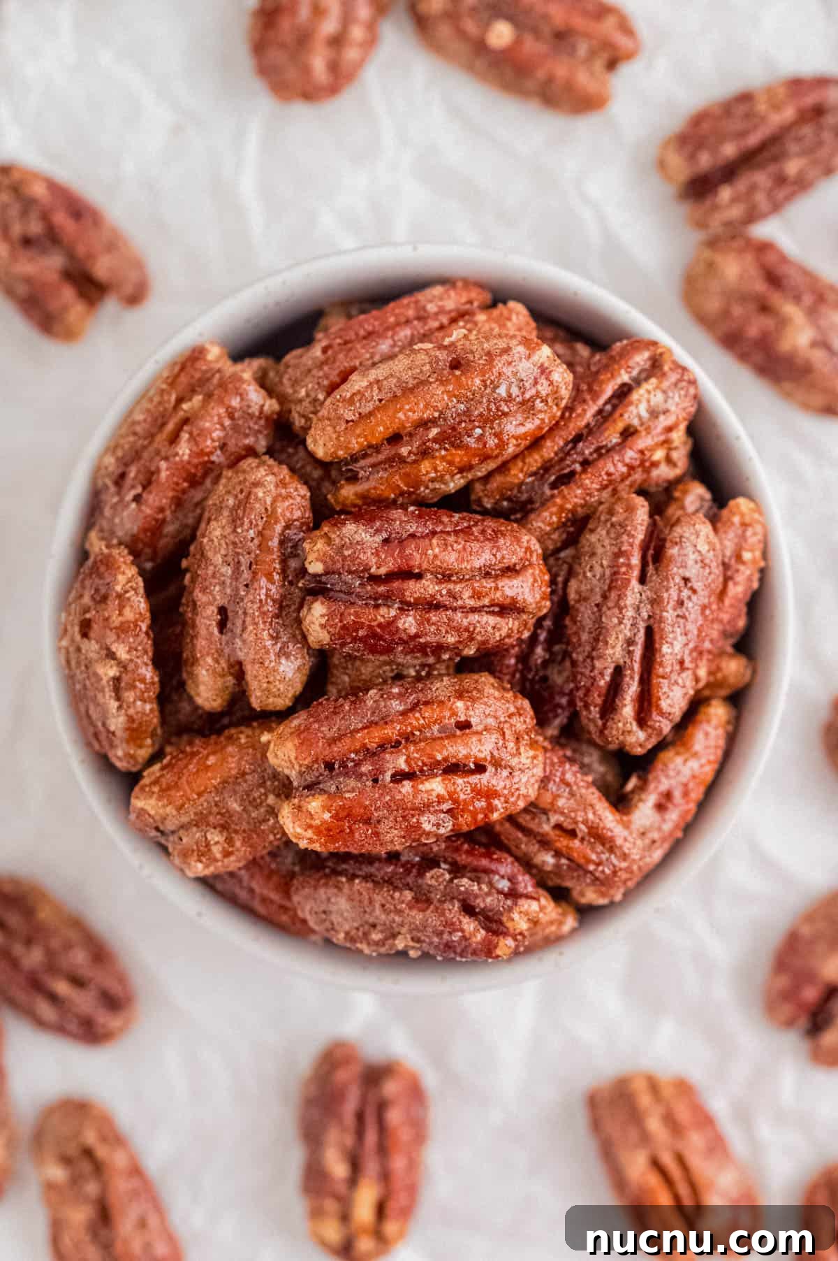 Sweet and Sticky Candied Pecans Recipe for Holiday Gifts 6 candied pecans in a bowl