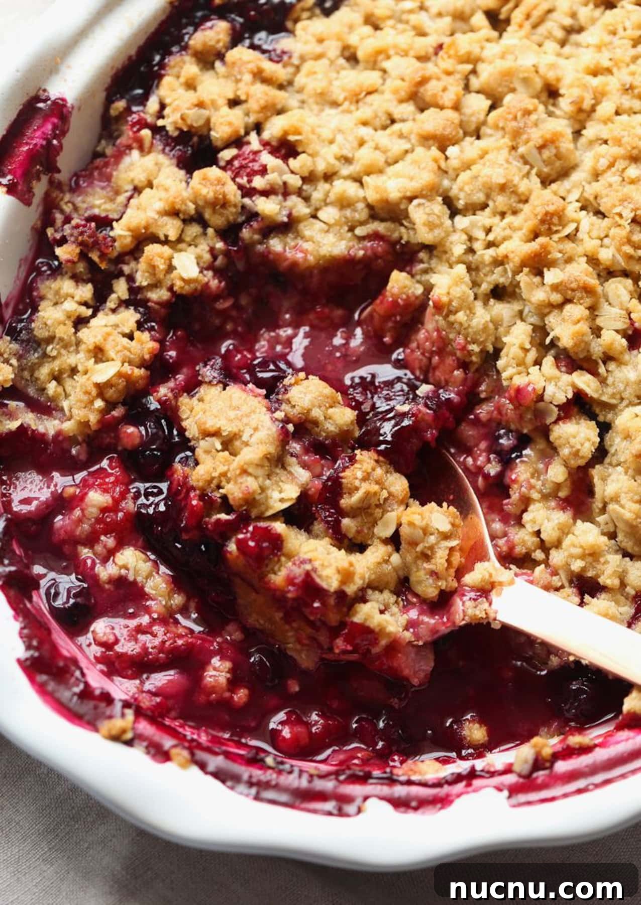 Mixed Berry Crisp Recipe topped with a buttery oat crumble
