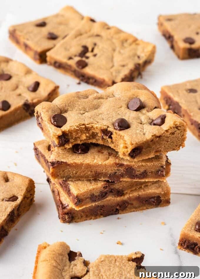 Chewy Peanut Butter Cookie Bars Recipe for Snack Lovers 9 stack of peanut butter chocolate chip cookie bars