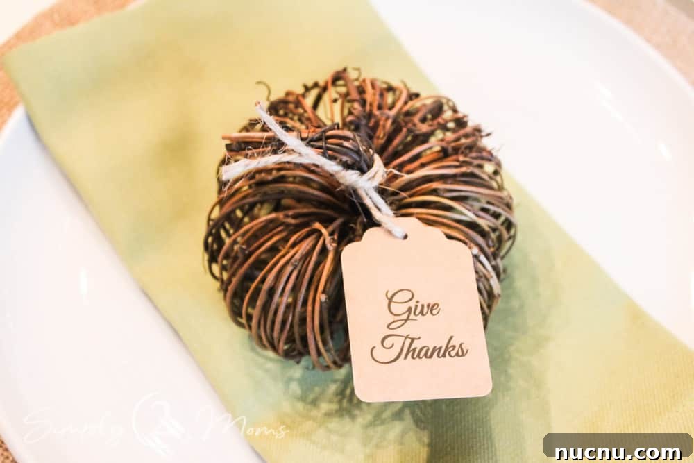 DIY Thanksgiving Place Cards: 3 Stylish Table Setting Ideas 5 close up of mini grapevine pumpkin and kraft paper tag