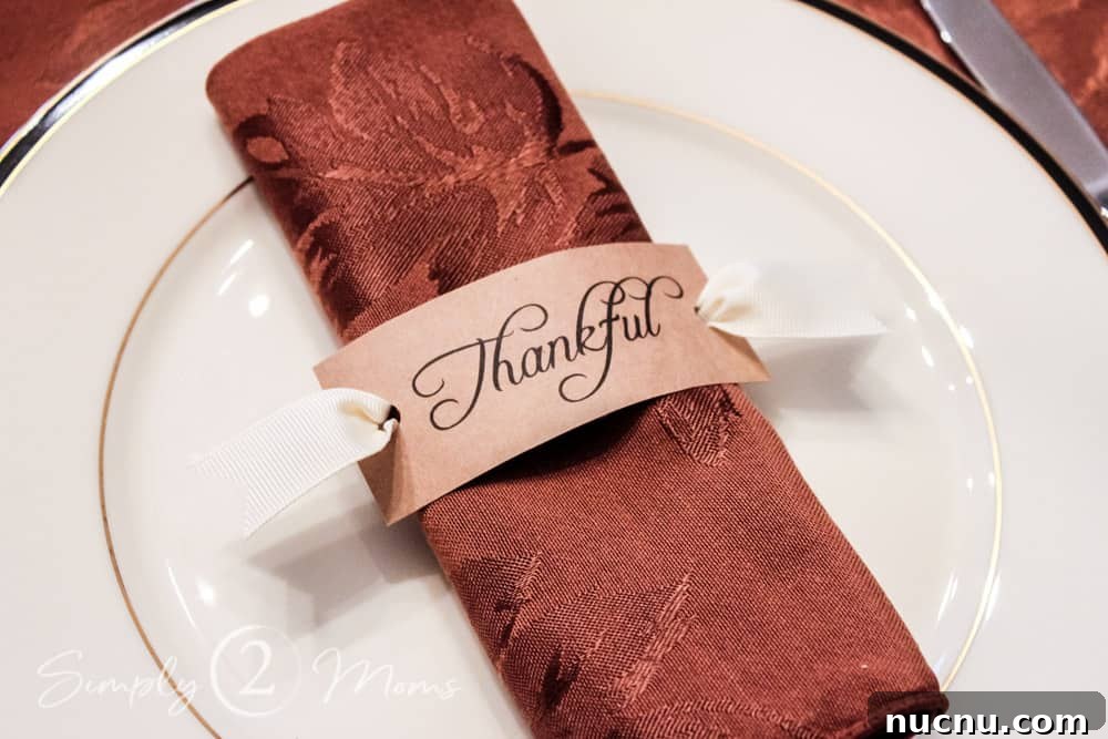 DIY Thanksgiving Place Cards: 3 Stylish Table Setting Ideas 8 napkin folded on plate with homemade thankful napkin holder