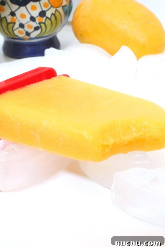 Tropical Mango-Pineapple Paletas #tropicalpaletas #mangopineapple #tropicalpopsicles
