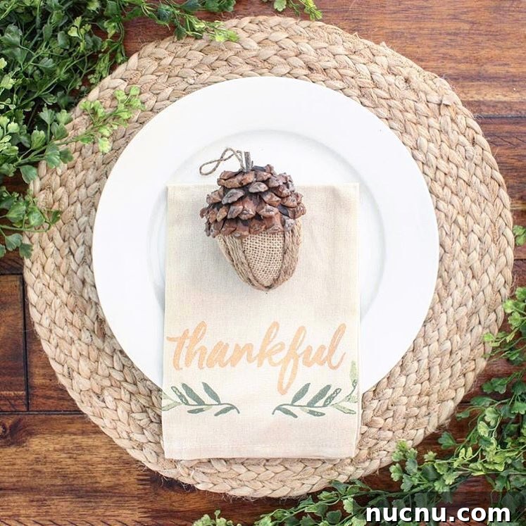 21 Stylish Thanksgiving Table Decor Ideas That Wow Guests 13 11. Acorn Ornament