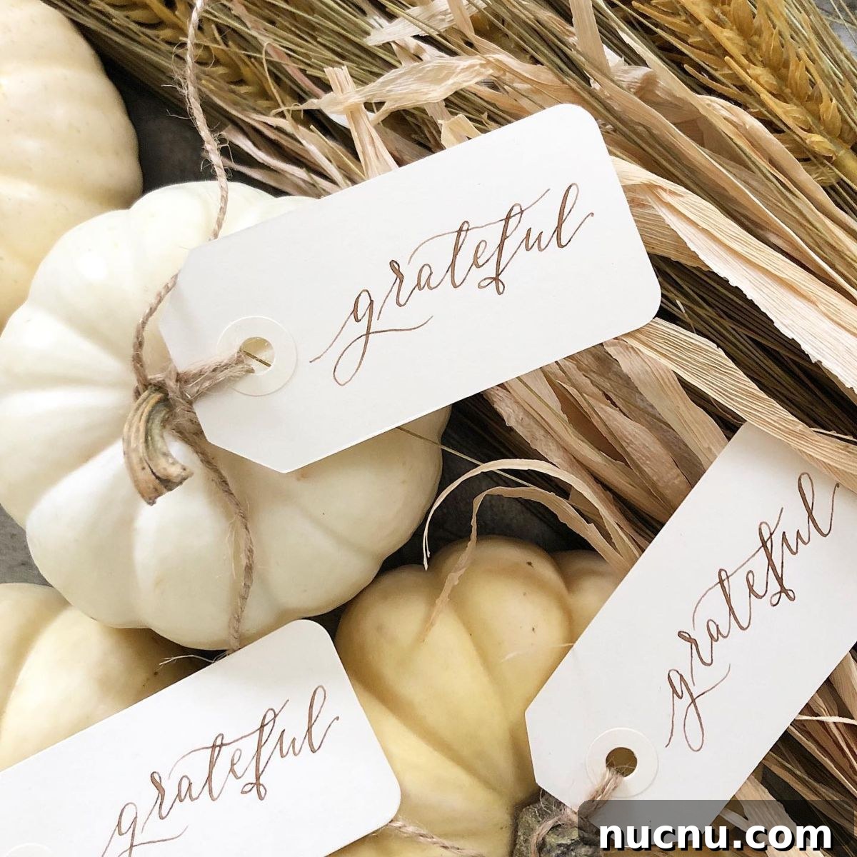 21 Stylish Thanksgiving Table Decor Ideas That Wow Guests 22 20. “Grateful” Pumpkin Tags