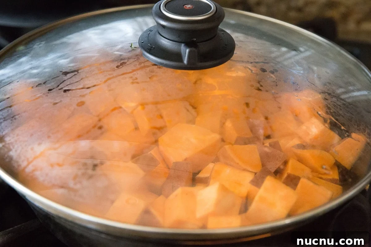 Cook the potatoes in the bacon fat, covered