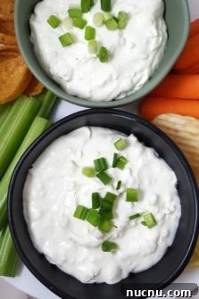 4-Ingredient Beer Cheese Dip Recipe for Game Day 6 two bowls filled with 4 Ingredient Beer Cheese Dip.