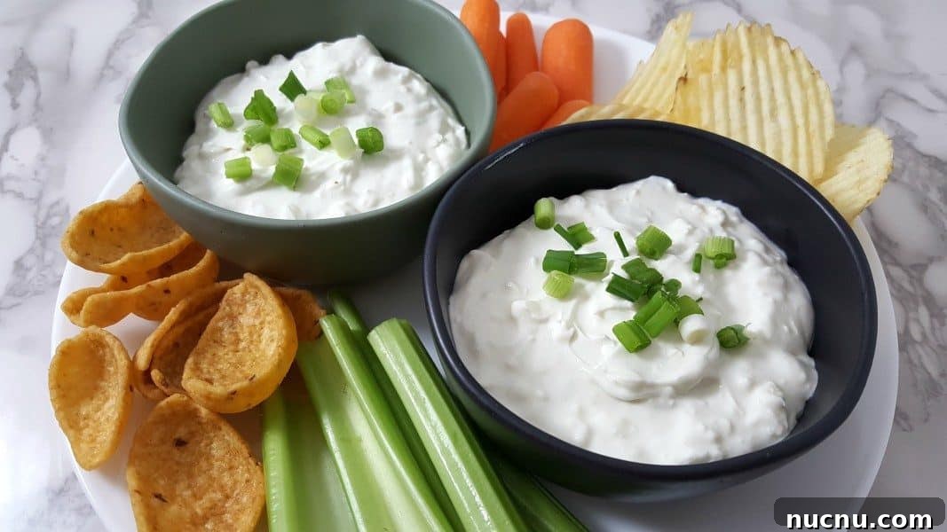 4-Ingredient Beer Cheese Dip Recipe for Game Day 5 4 Ingredient Beer Cheese Dip in two bowls.