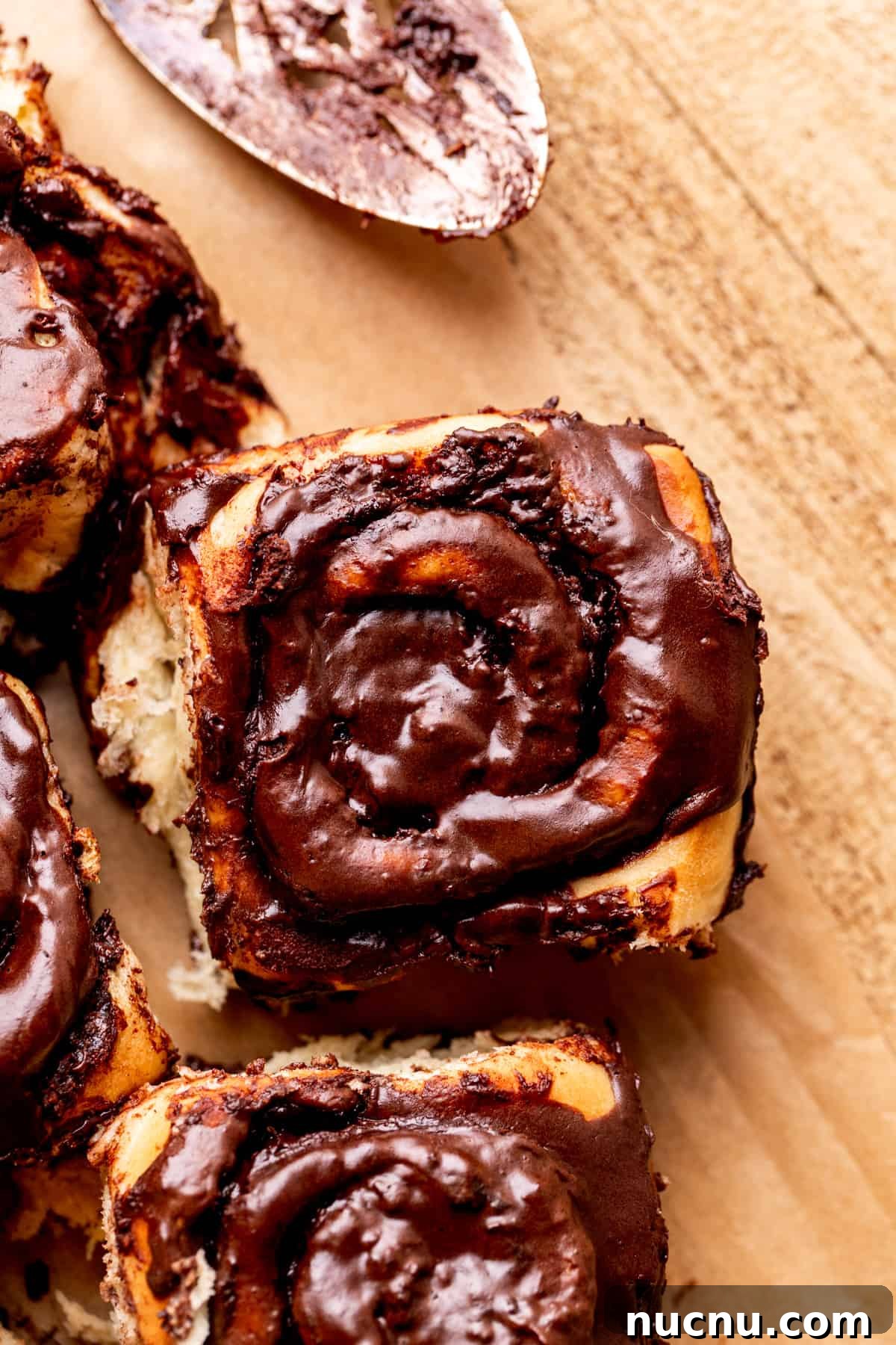 Decadent Chocolate Cinnamon Rolls with Gooey Chocolate Swirl 2 One chocolate cinnamon roll.