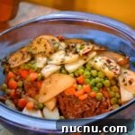 Classic Cottage Pie Recipe: Comforting Beef and Mash Dinner 11 Traditional cottage pie with servings scooped out of dish
