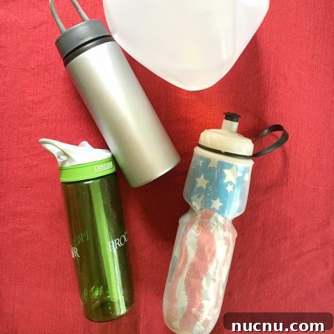 Reusable water bottle travel tip
