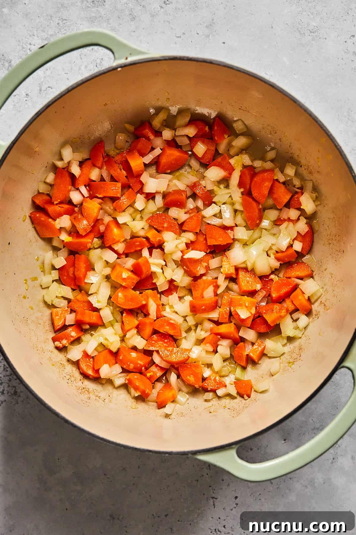 onions and carrots in a pot