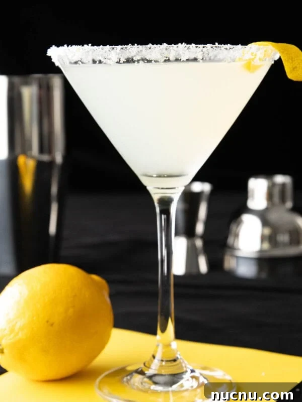 Peppermint Martini Recipe: How to Make a Refreshing Holiday Cocktail 7 The best lemon drop martini recipe served in a martini glass with a lemon sugar rim and a lemon twist.
