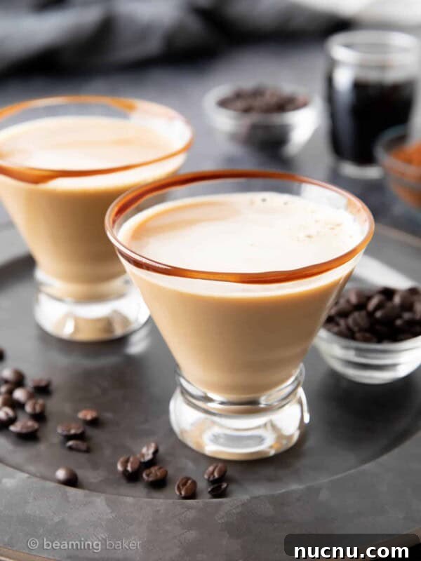 Peppermint Martini Recipe: How to Make a Refreshing Holiday Cocktail 9 Two martini glasses filled with chocolate espresso martini