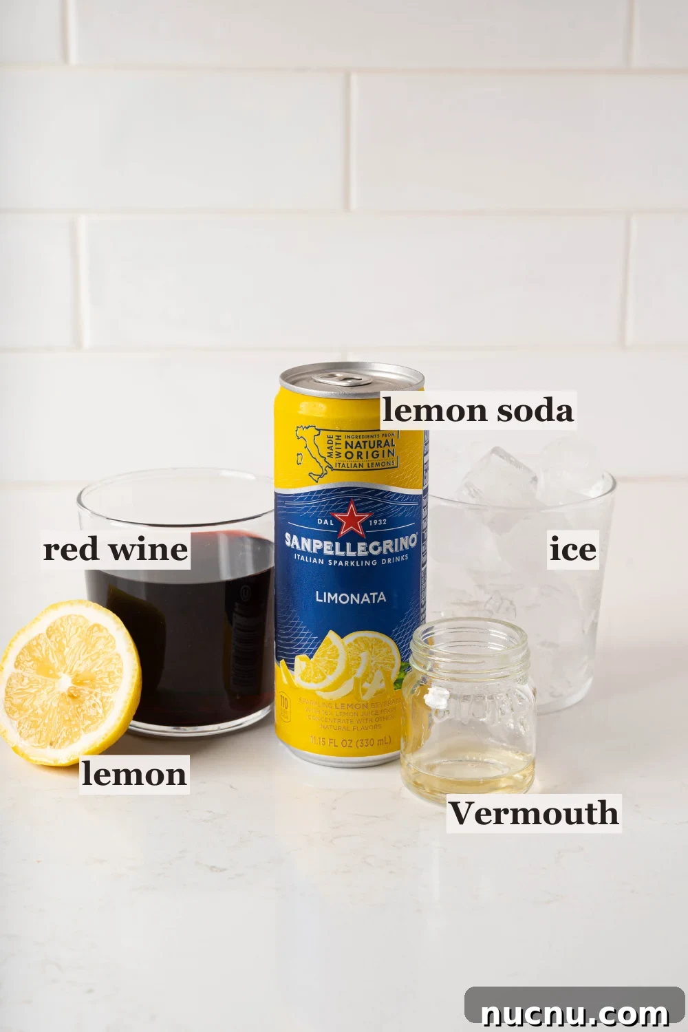 Red wine, ice, lemon soda, and Vermouth.