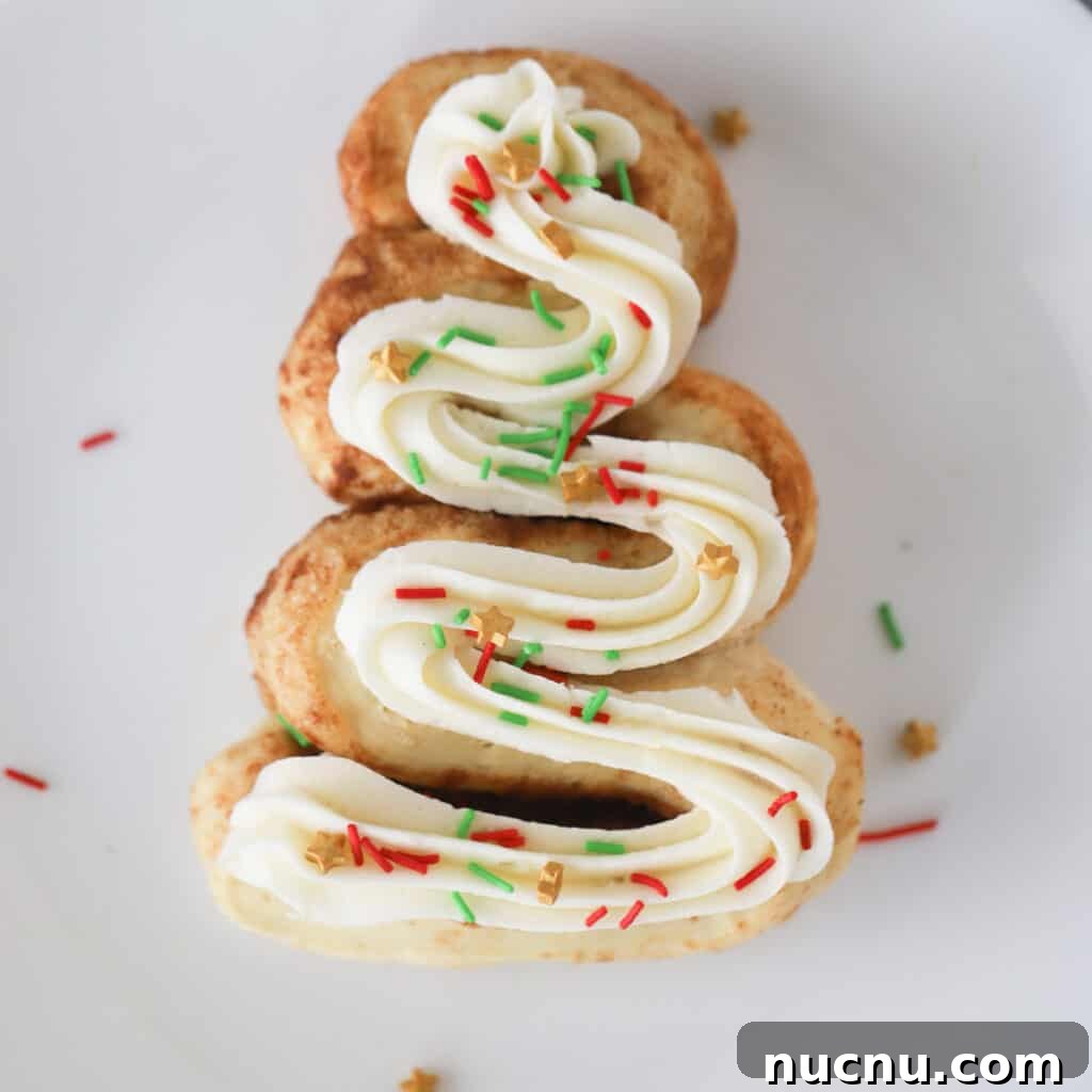 Cinnamon Roll Recipes: Classic, Gooey, and Irresistible Options 6 A cinnamon roll shaped like a christmas tree.