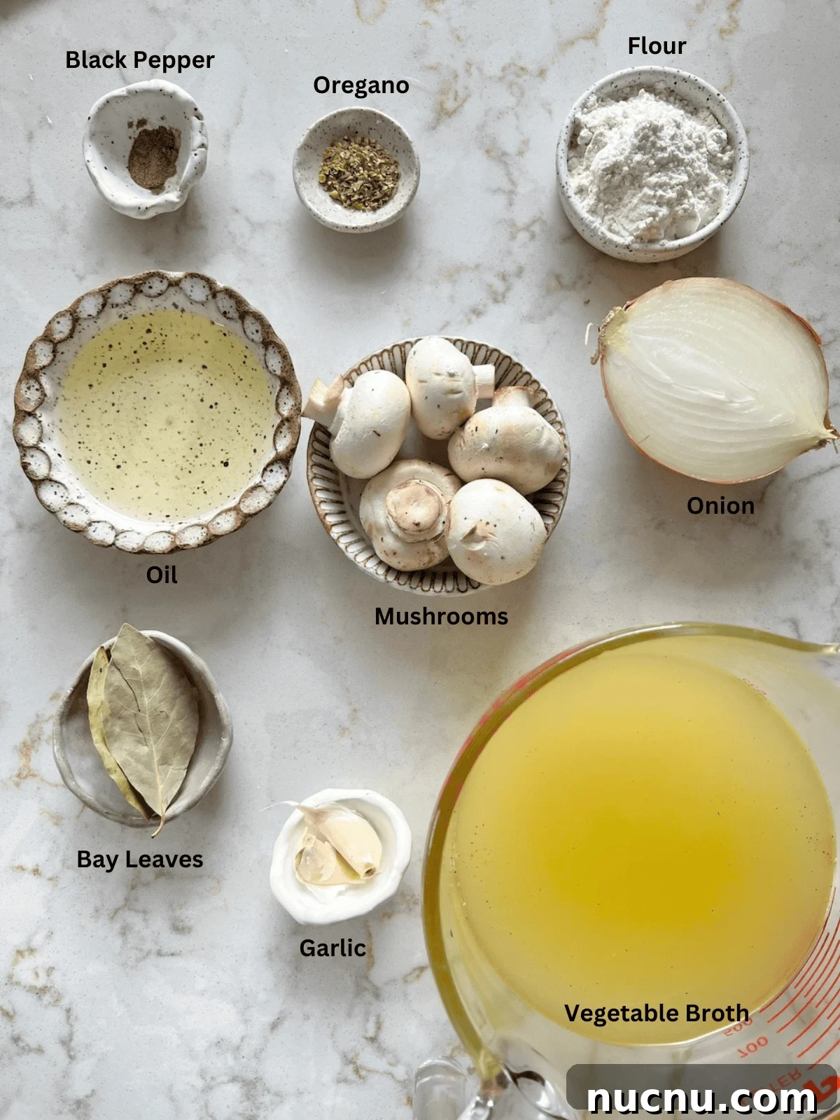 ingredients for Mushroom Gravy measured out on a white surface