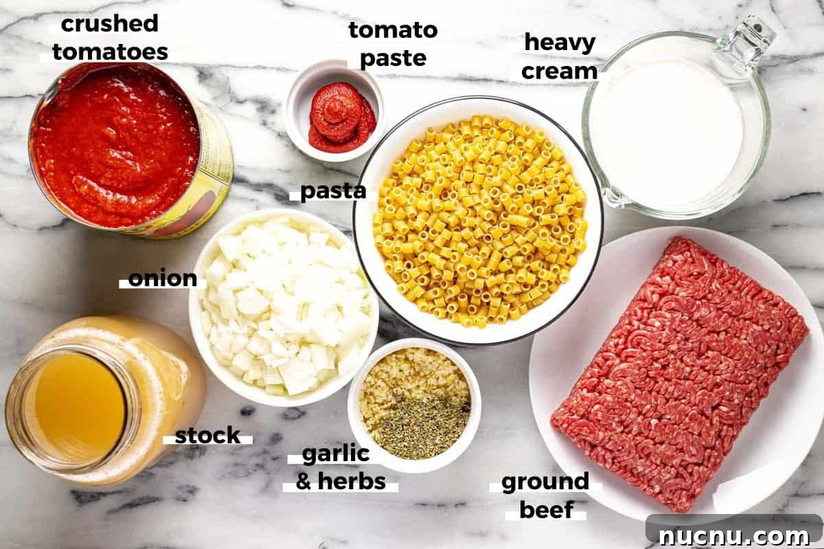 Creamy Beef and Tomato Noodle Soup Recipe 3 Bowls of ingredients to make creamy tomato soup with ground beef.