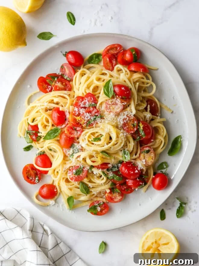 Lemon Pasta with Cherry Tomatoes and Fresh Basil Recipe 8 lemon pasta with tomatoes and basil on a plate