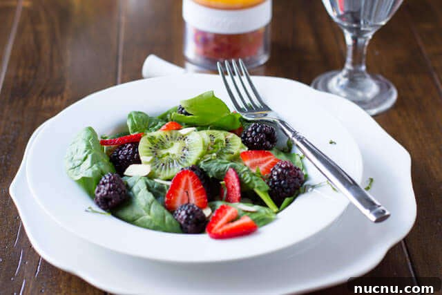 White Balsamic Berry Salad recipe is one of our favorite sides when we are looking for something light, healthy and a great presentation.