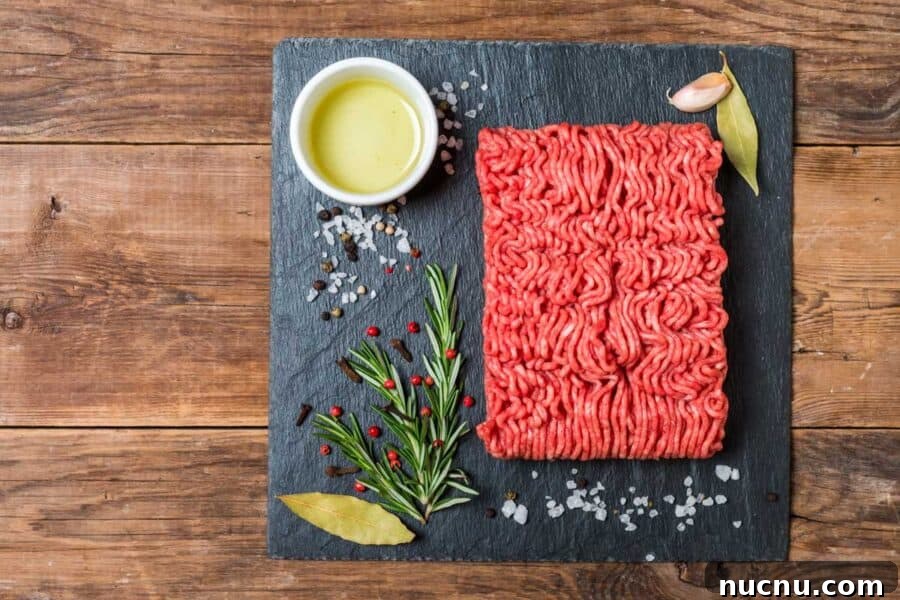 Kentucky Bourbon–Glazed Beef Jerky Recipe 4 Ground meat on slate with spices