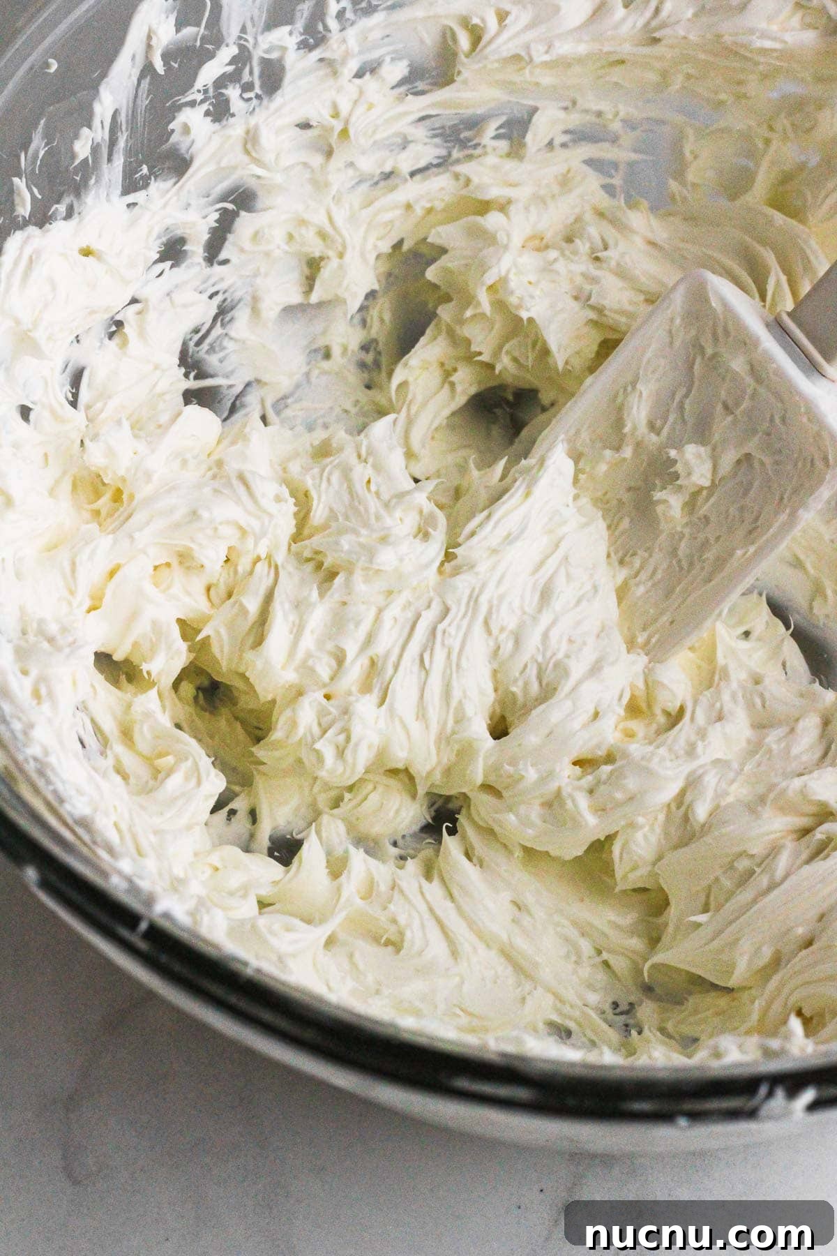 Whipped cream cheese in a bowl.